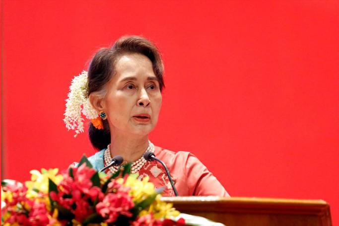 State Counselor Aung San Suu Kyi attempts to promote investment during the opening ceremony of Invest Myanmar Summit