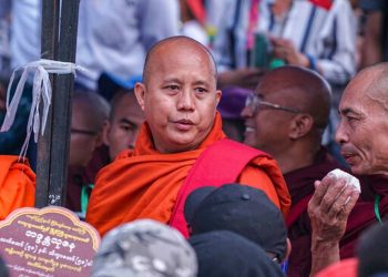 Hardline Myanmar monk's supporters protest arrest warrant